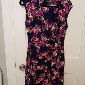 Floral dress in blue with ruffle in front